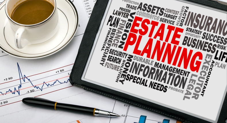 Tablet showing the words Estate Planning on surrounded by associated words with Estate Planning