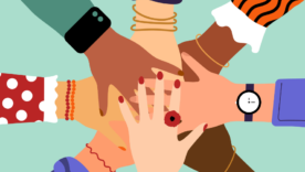 Hands of diverse group of people stacked together