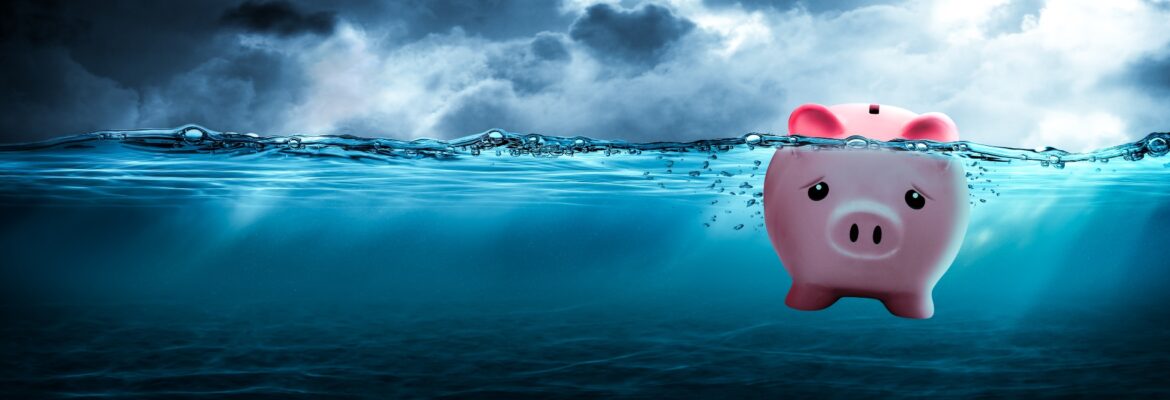 Piggy Bank Drowning In Dark Stormy Waters - Financial Debt Concept