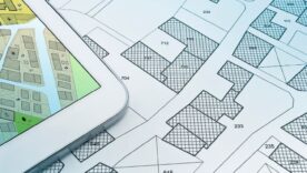 Buildings Permit concept with imaginary cadastral on digital tablet