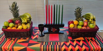 Table decorated in traditional Kwanzaa decor.