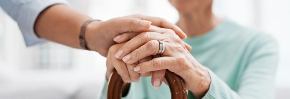 Senior woman, walking cane and holding hands of nurse with healthcare support for retirement. Caregiver, elderly female person and empathy with care and nursing of patient with help in a home.