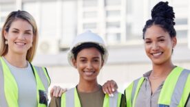 Architecture, women construction team and diversity in portrait, contractor group with smile at building site.